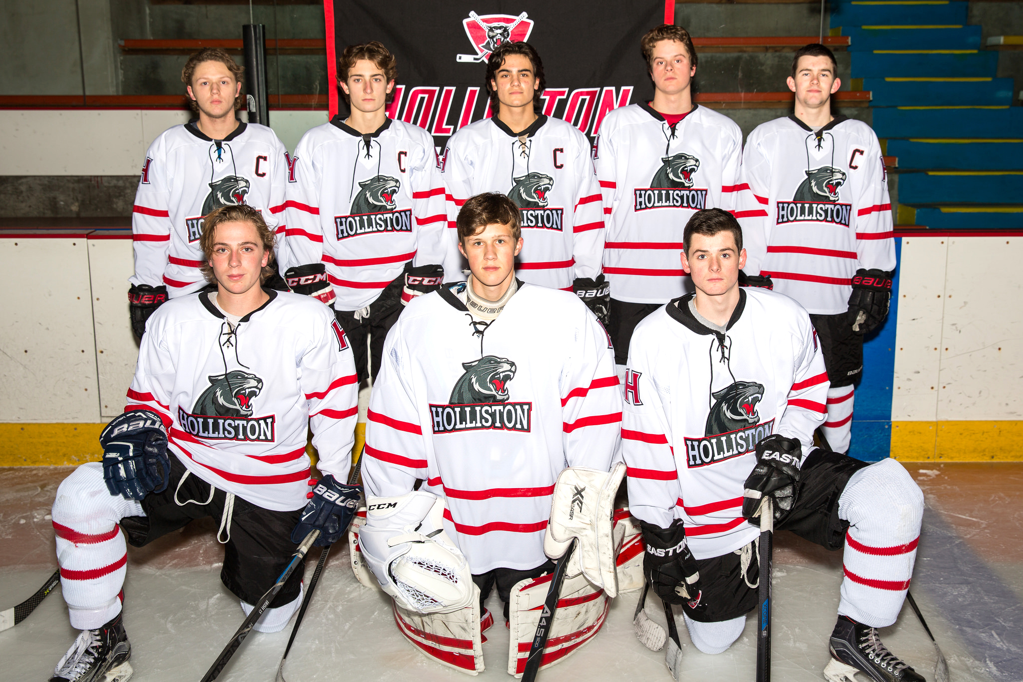 Eight seniors who’ve played a role in helping the Holliston hockey team improve are, front row from left, Jake Kober, James Crews, and Will Fitzgerald. Back row, from left, are Jack Wilkie, Jack Larche, Tim Ringie, Cam DeCristofaro, and James Franco.