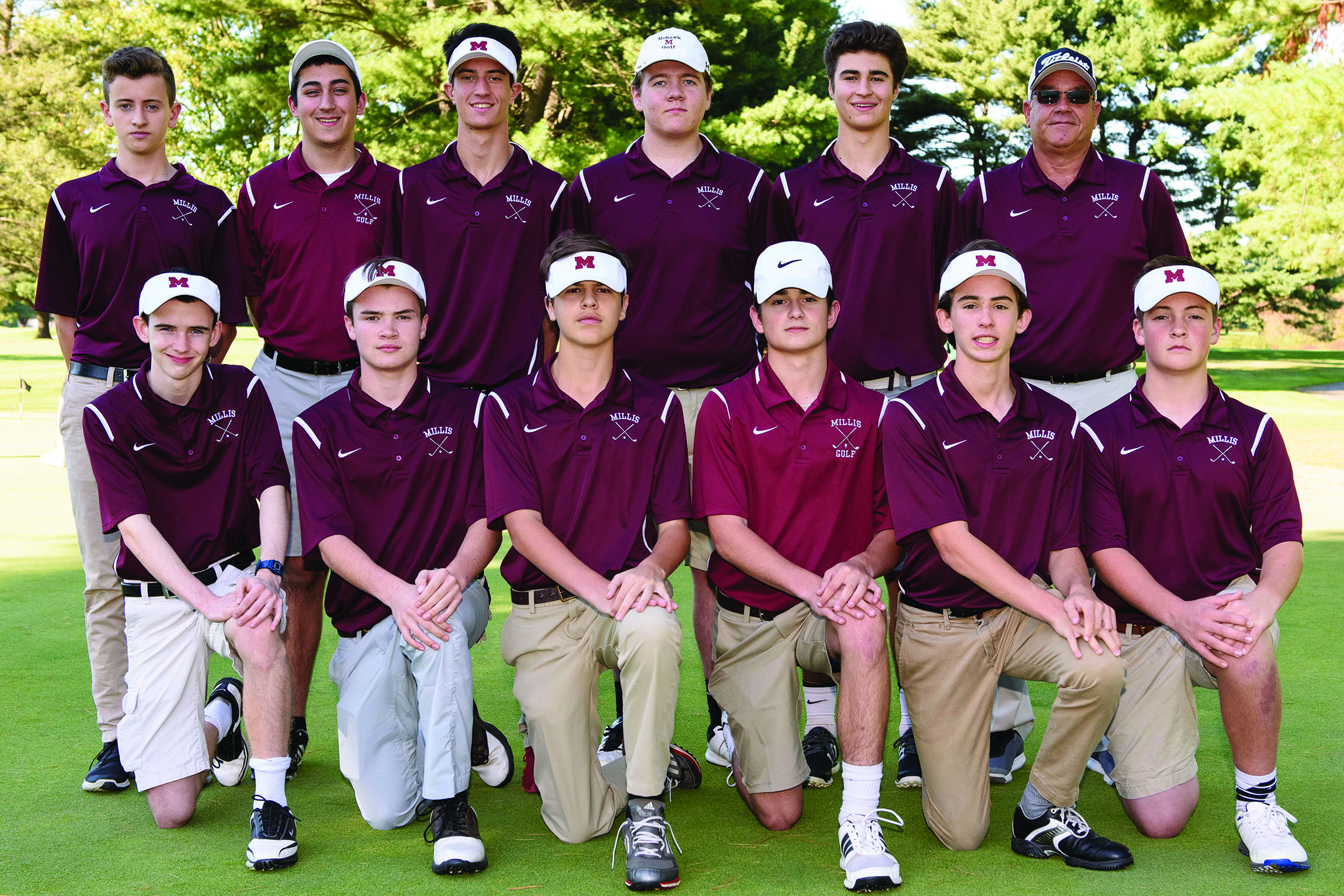Millis High Golf, which usually sees low numbers, drew a large number this year. Coach Hodgdon is working on teaching the largely young players good habits on the green.