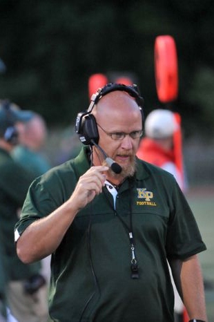 Coach Brian Lee has guided KP's football team to a 25-game winning streak and two consecutive Super Bowl championships. (Photo by Scott May)