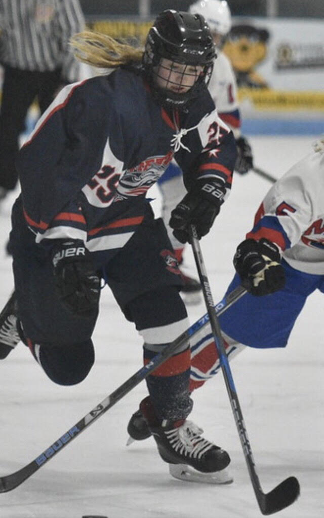 Millis students Emma Rice and Marina Yasuna have found the Medway-Ashland girls’ hockey team to be a welcoming group, despite the challenge of traveling to practice in Marlboro.