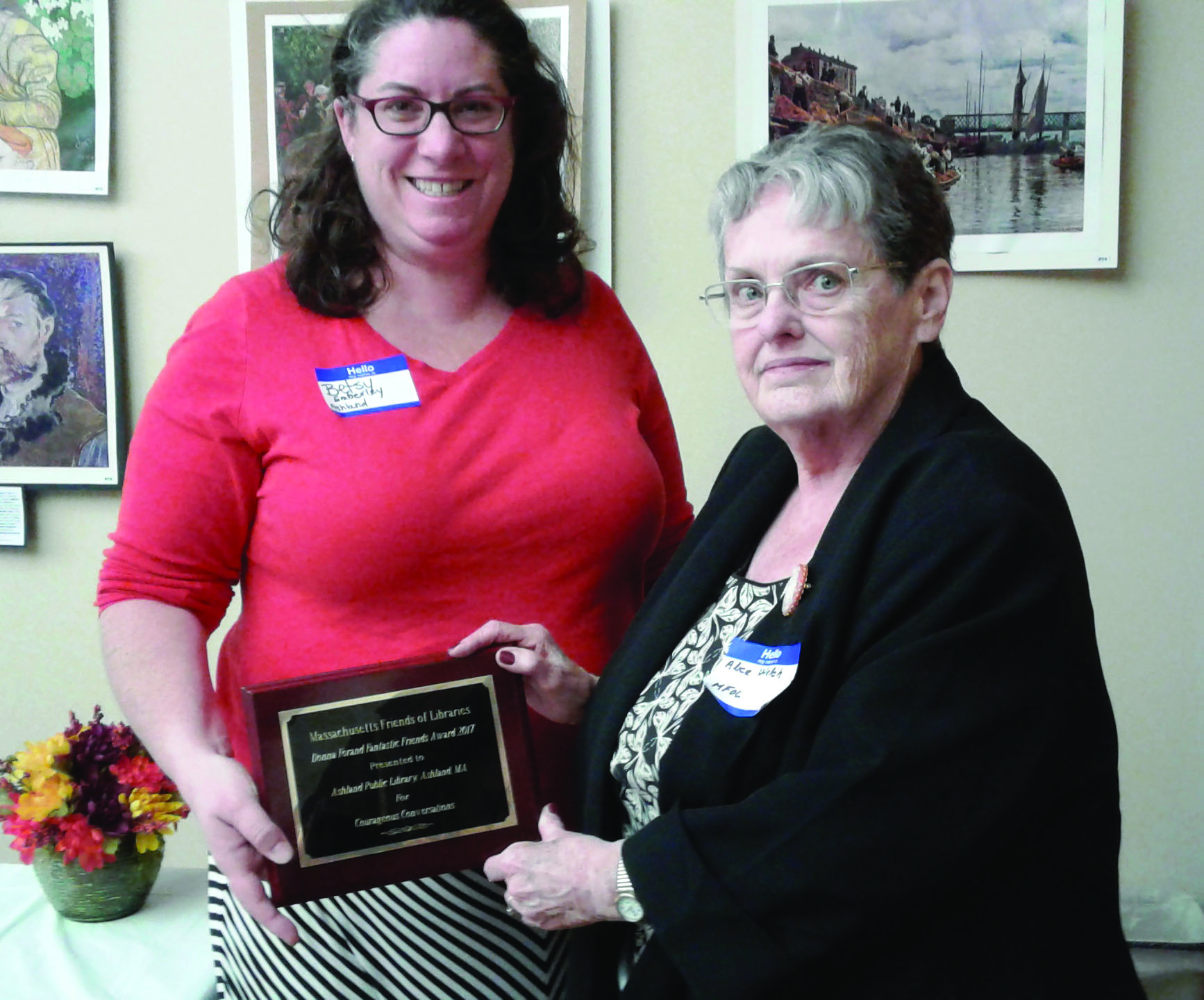 Friends of the Ashland Public Library President Betsy Emberley (left) accepts the 2017 Fantastic Friends Award from Mass. Friends of Libraries President Alice Welch. (Photo/Cynthia Whitty)
