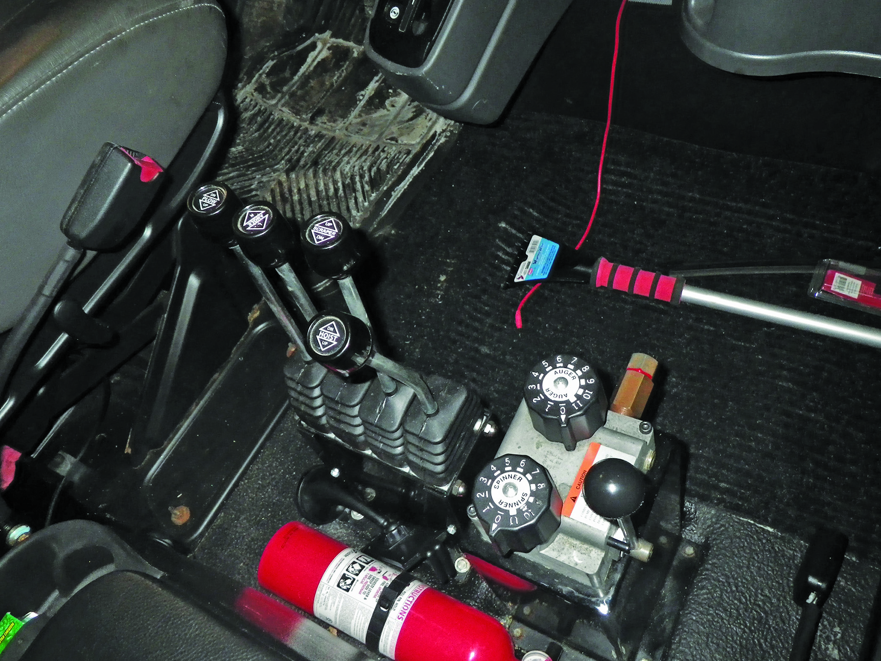 Multiple controls inside the large cab.