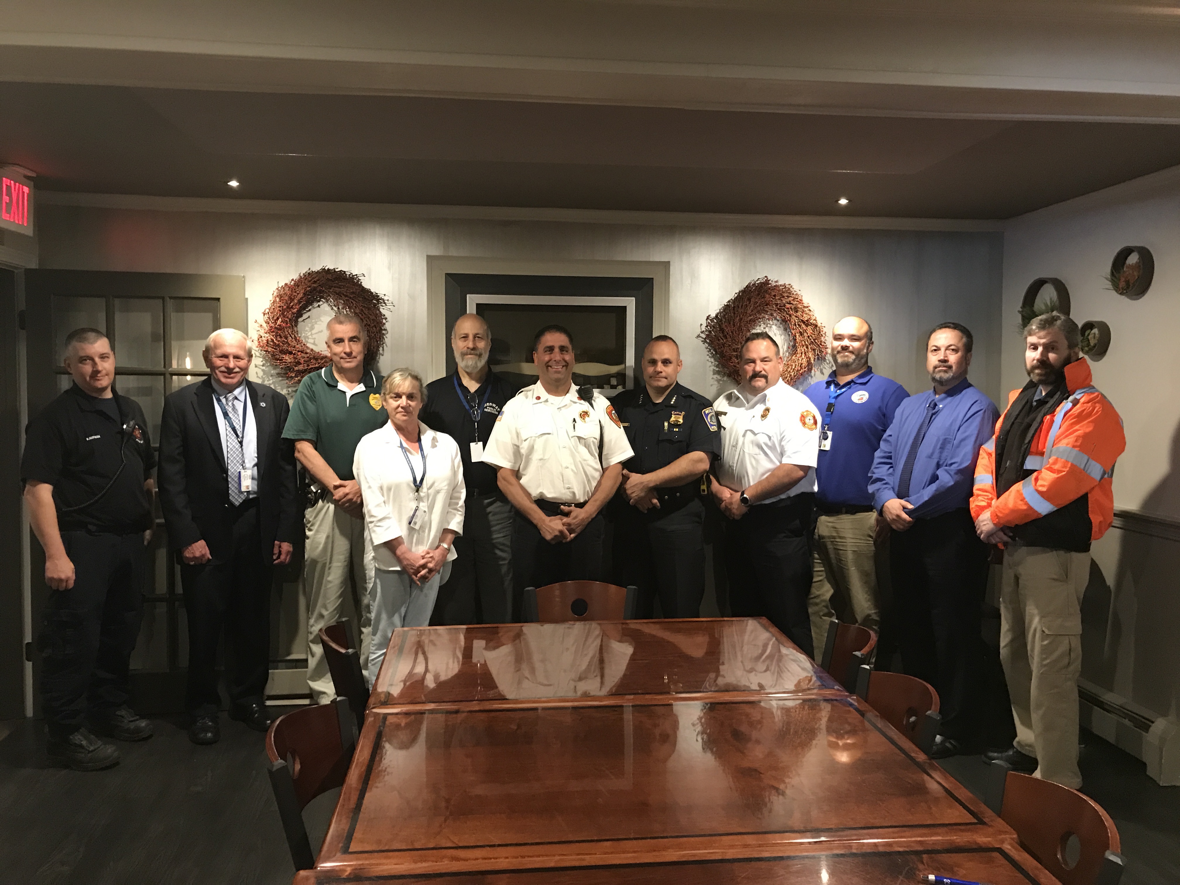 Local emergency and town officials recently attended a tabletop emergency planning meeting of the Central Norfolk Regional Emergency Planning Committee. From left, Jim Kaufman, EMS Coordinator, Medway Fire, Doug Forbes, MEMA, Medway Police Chief Allen Tingley, Beth Hallal, Health Director, Medway, Dave D’Amico, DPW Dir. Medway, Mike Fasolino, Dep. Fire Chief, Medway, Millis Police Chief Chris Soffayer, Millis Fire Chief Rick Barrett, Peter Pelletier, Dep. DPW Dir., Medway, Millis Town Administrator Michael