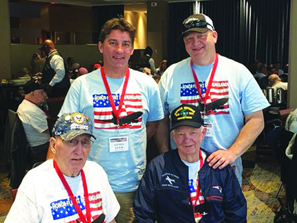 Franklin firefighter Steve Lewis was so impressed with his father, Al’s experience with Honor Flight that he hopes to persuade local groups to support the effort. Back, Left to Right, Steve Lewis, Patrick Weidman, front, left to right Al Lewis, Bob Weidman, all Franklin residents, contributed photo